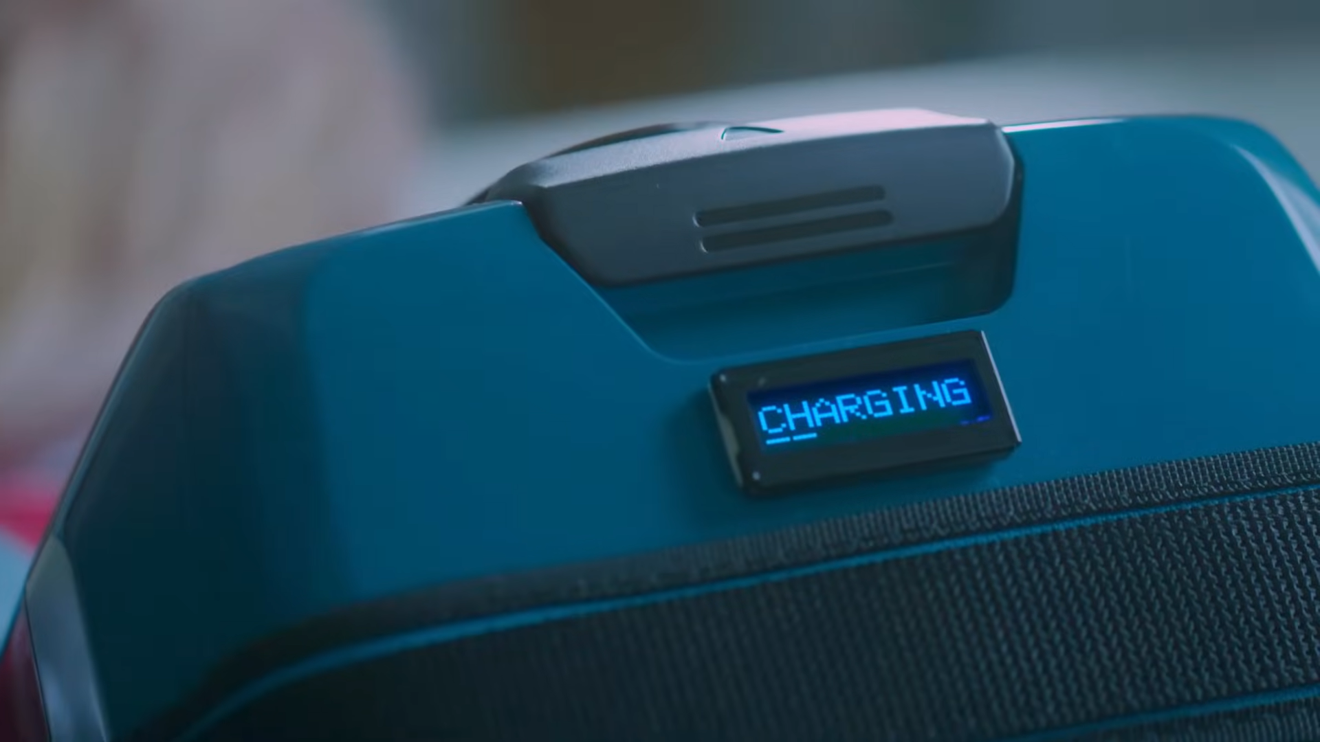 A screen on the backpack that says 'Charging.'
